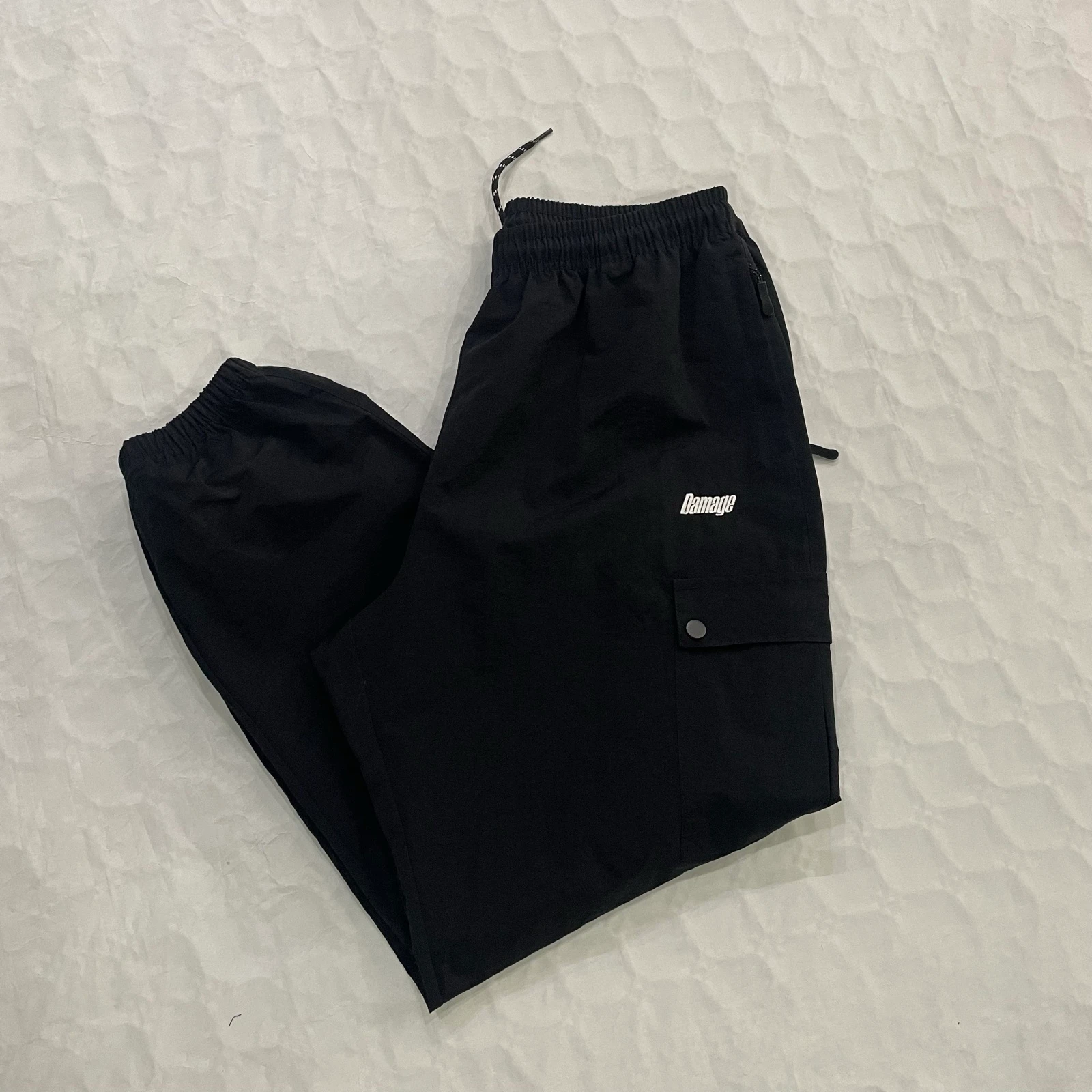 Pantalón Damage - Cargo Track Pant (Black)